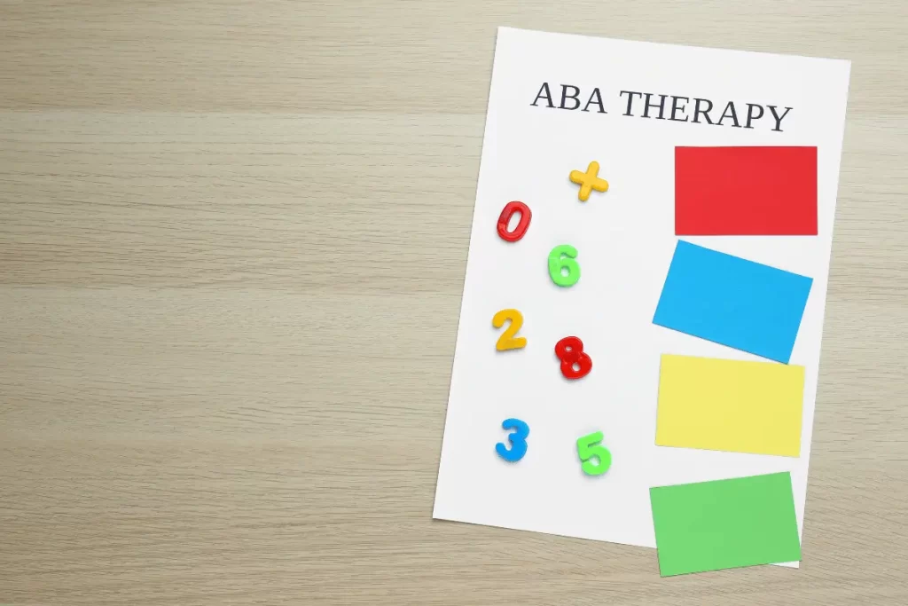numerini e foglietti e la scritta "ABA Therapy"